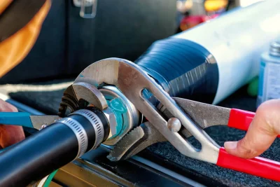 Pipe repair service using professional plumbing tools in Boynton Beach, Florida